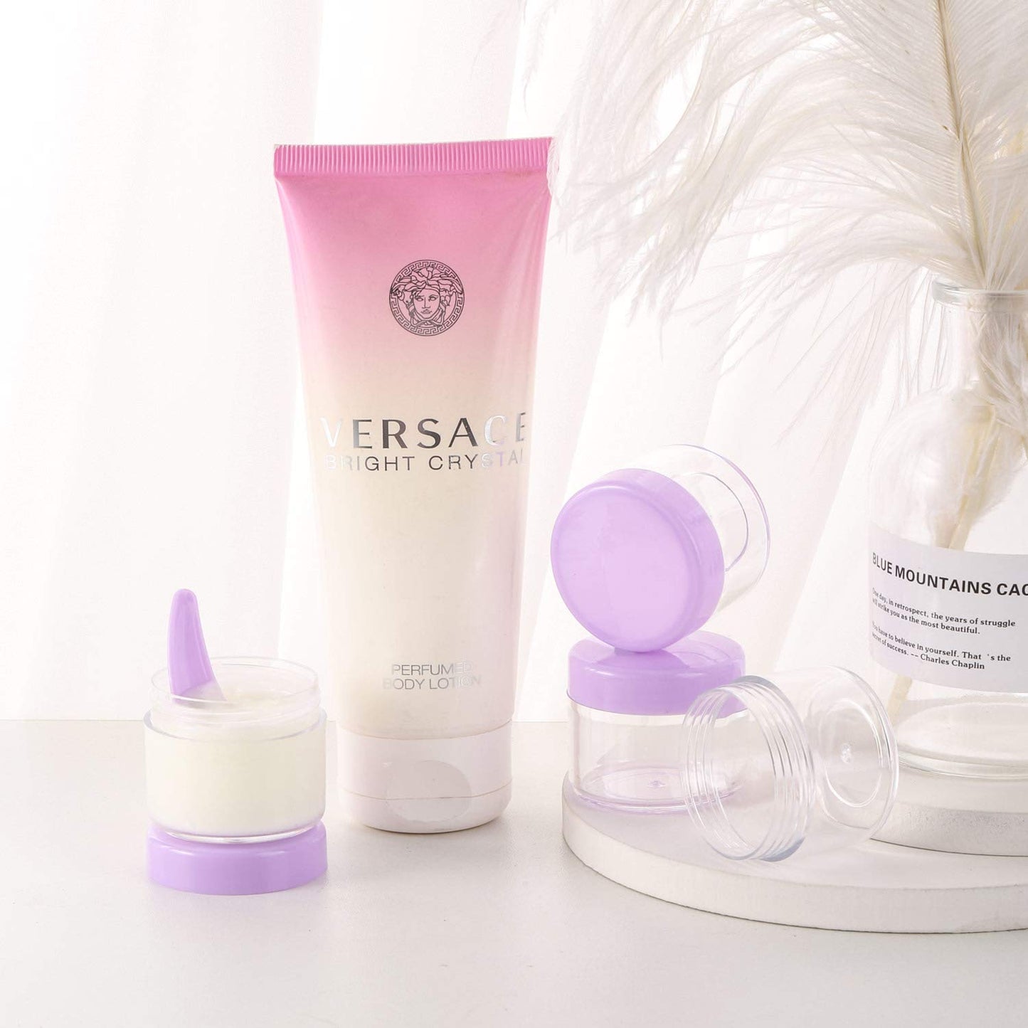 Refillable Cosmetic Sample Jars - 100 Pack 20g (0.7oz) Purple Small Travel Containers with Lids + 10 Mini Makeup Spatulas - BPA Free-BrightBean Baby