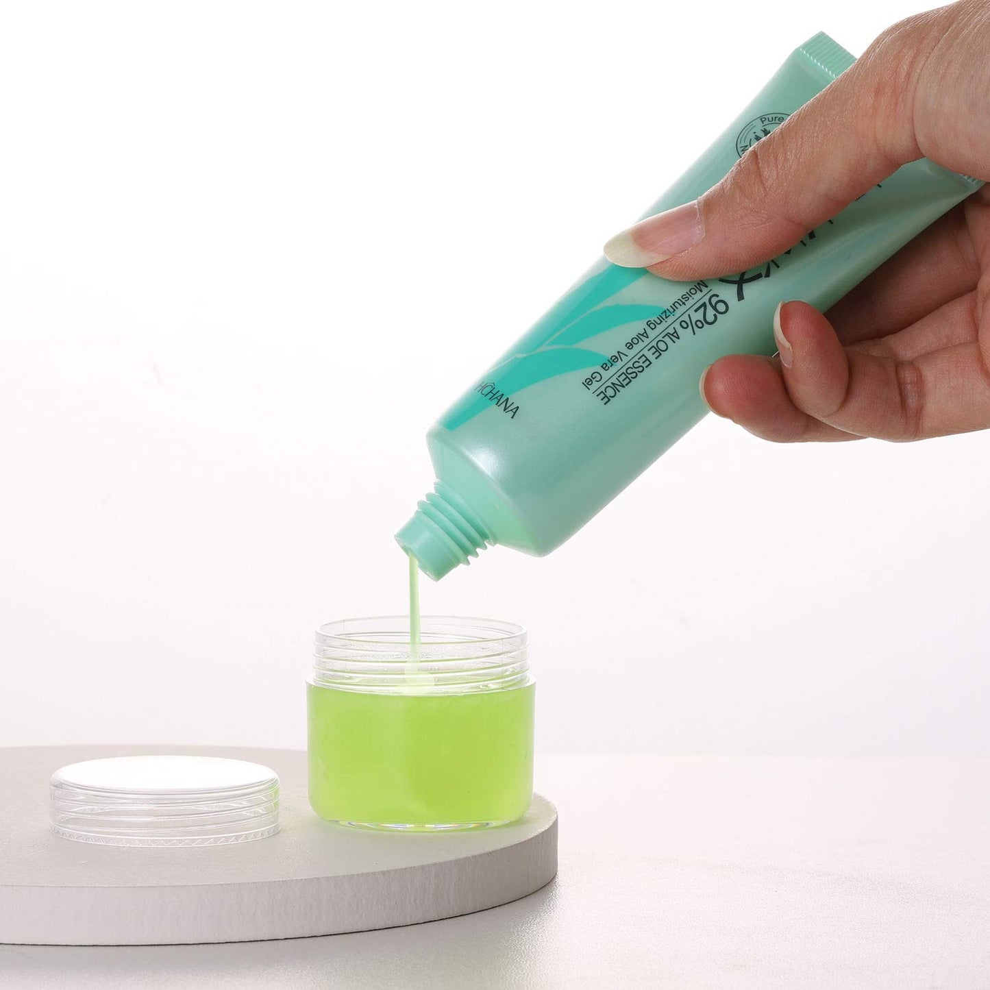 Refillable Cosmetic Sample Jars - 100 Pack 20g (0.7oz) Clear Small Travel Containers with Lids + 10 Mini Makeup Spatulas - BPA Free-BrightBean Baby