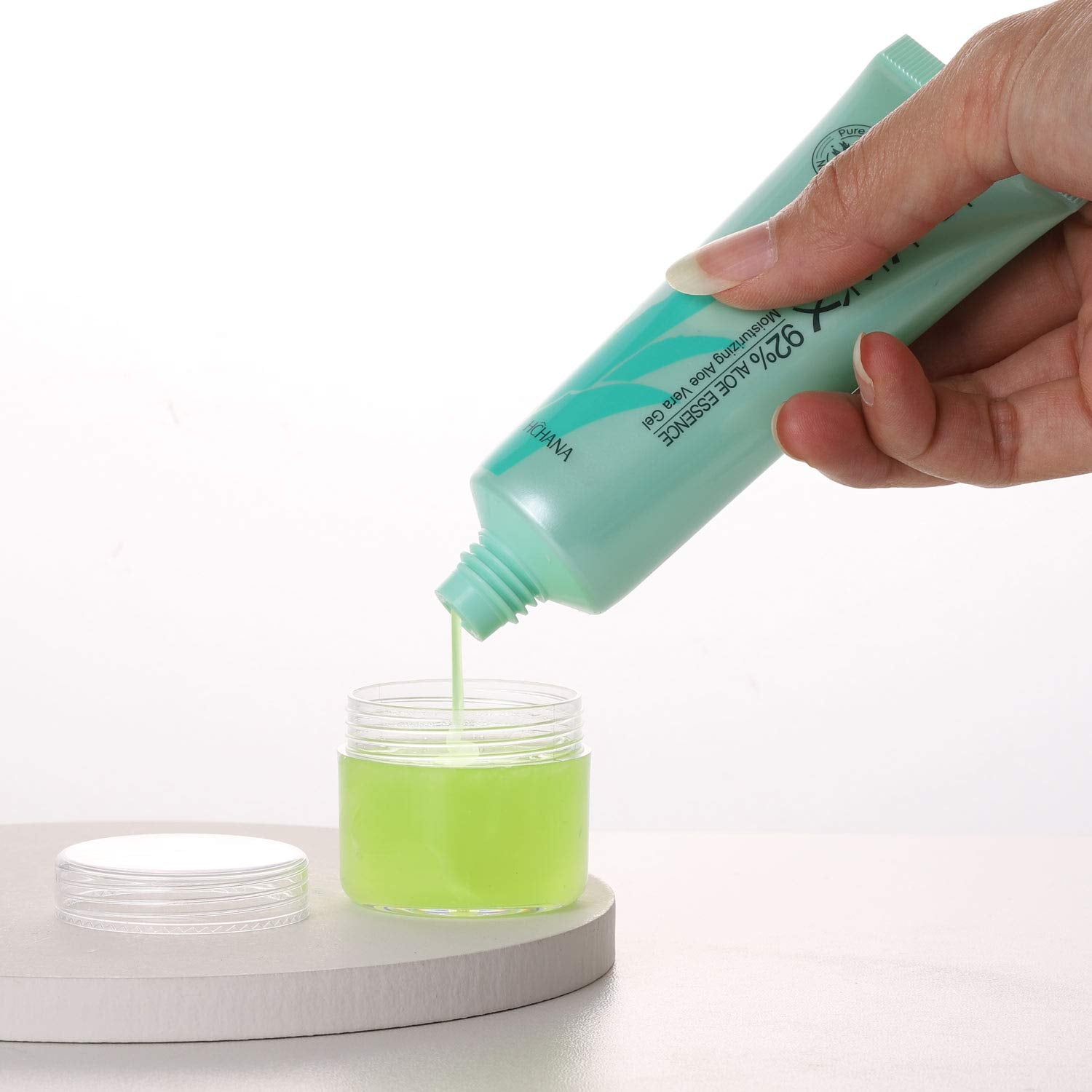 Refillable Cosmetic Sample Jars - 100 Pack 20g (0.7oz) Clear Small Travel Containers with Lids + 10 Mini Makeup Spatulas - BPA Free-BrightBean Baby