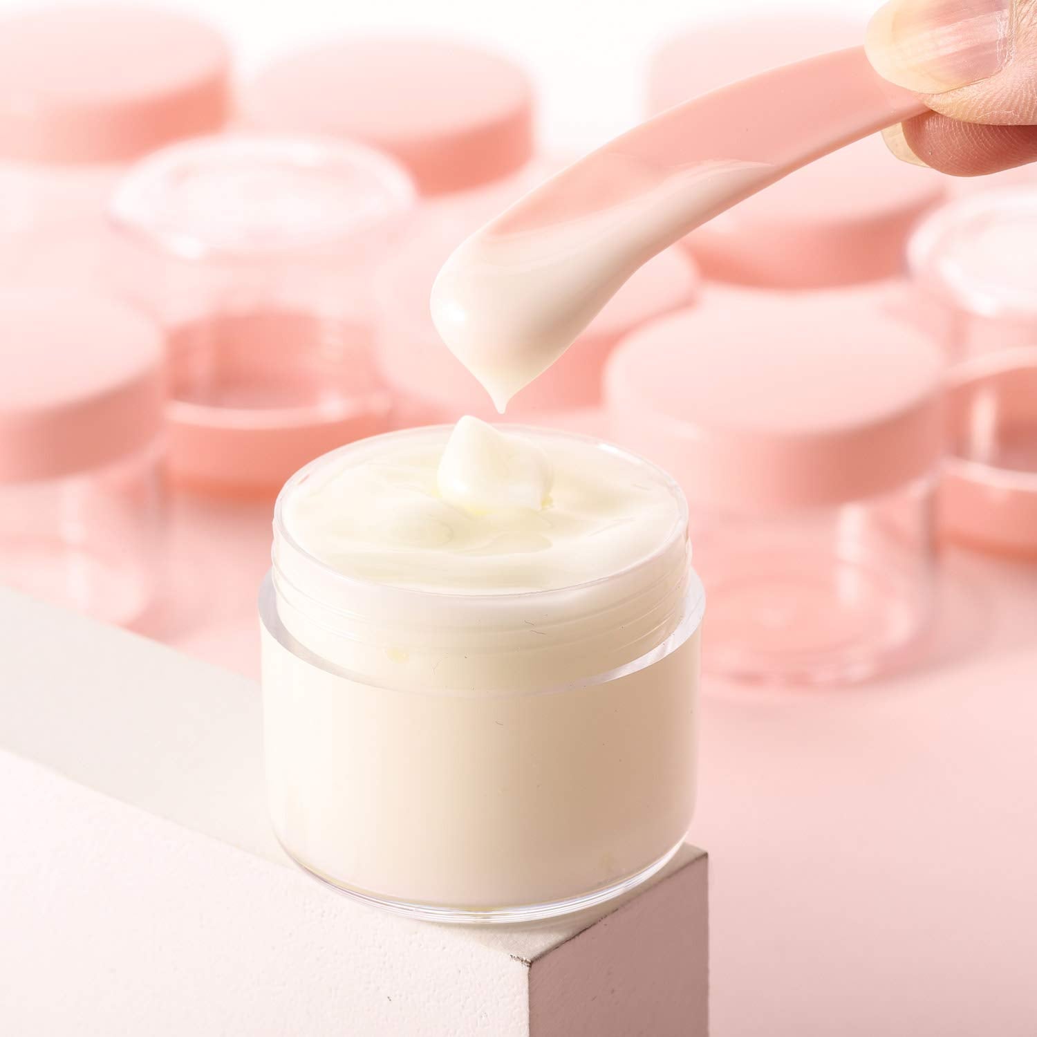 Refillable Cosmetic Sample Jars - 100 Pack 20g (0.7oz) Pink Small Travel Containers with Lids + 10 Mini Makeup Spatulas - BPA Free-BrightBean Baby