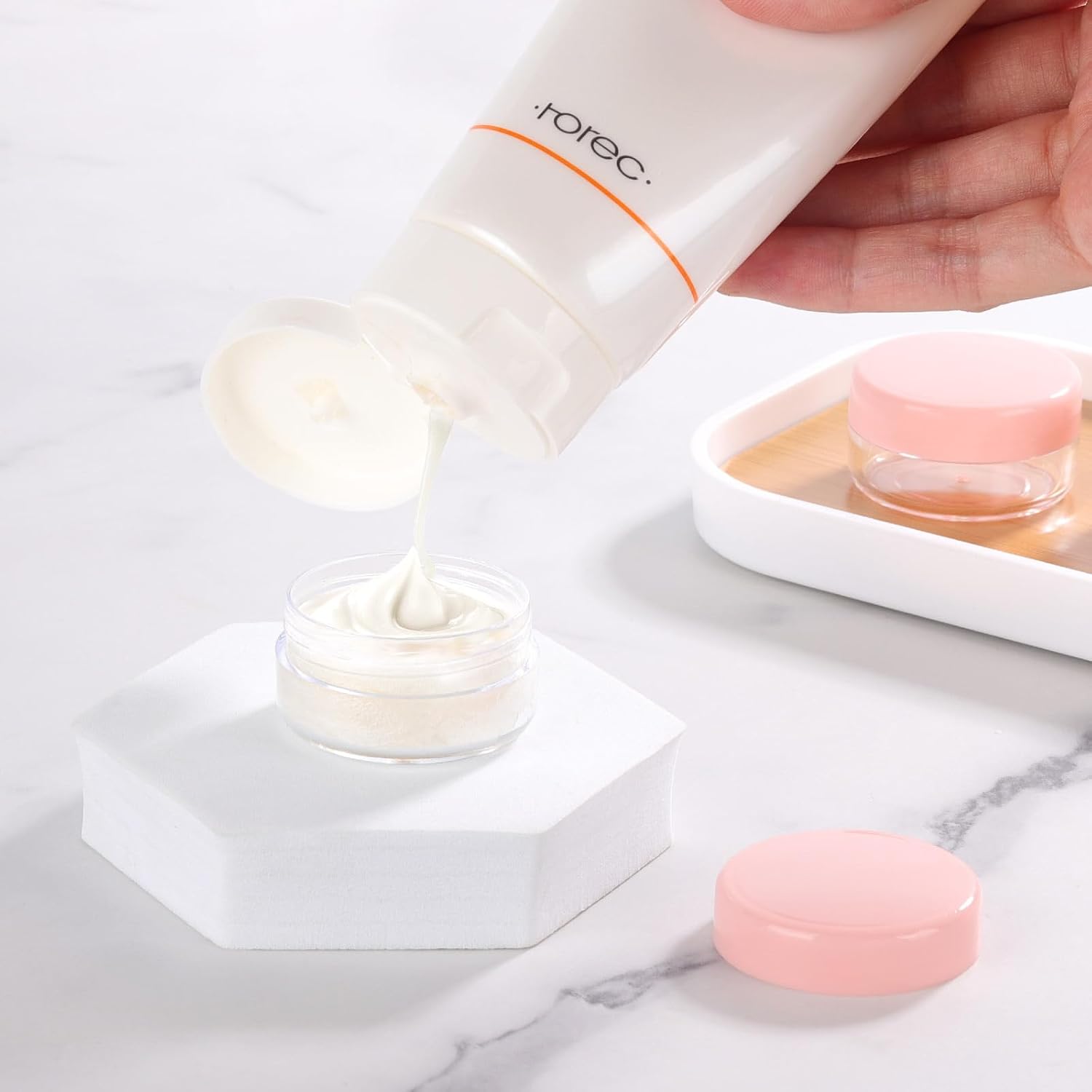 Refillable Cosmetic Sample Jars - 100 Pack 10g (0.35oz) Pink Small Travel Containers with Lids + 10 Mini Makeup Spatulas - BPA Free-BrightBean Baby