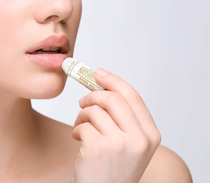 32-Pack Lip Balm in Bulk by Naturistick. Assorted Scents. 100% Natural Ingredients. Includes Mini Display Fishbowl. Best Beeswax Chapstick for Dry, Chapped Lips. Made in USA-BrightBean Baby