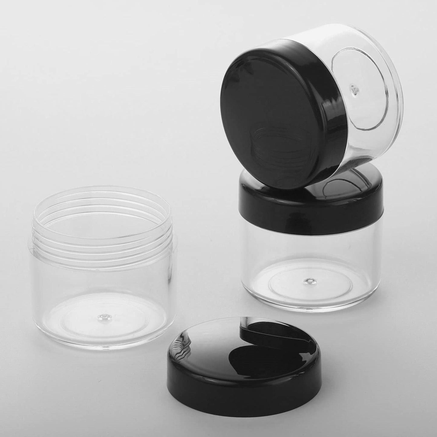 Refillable Cosmetic Sample Jars - 100 Pack 20g (0.7oz) Black Small Travel Containers with Lids + 10 Mini Makeup Spatulas - BPA Free-BrightBean Baby